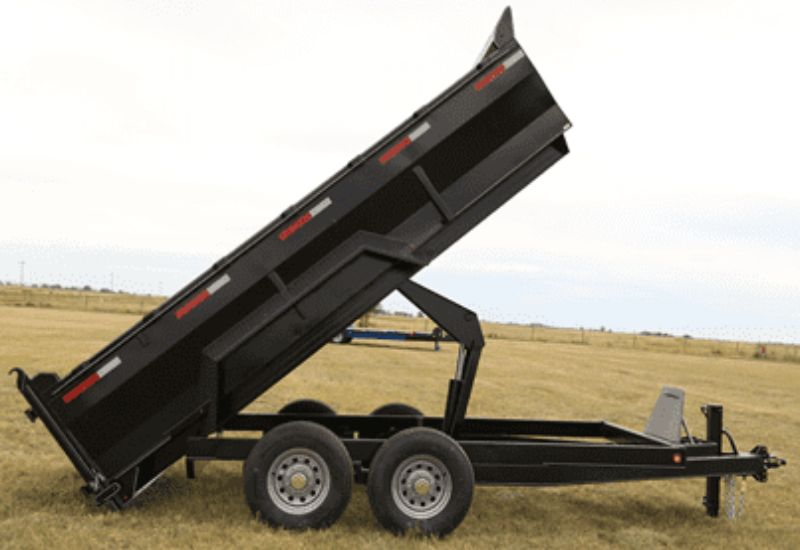 A large utility and dump Oasis Trailer.